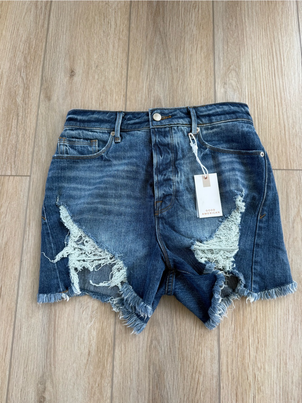 Good American Distressed Dark Blue Denim Shorts